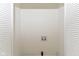 Compact laundry room featuring white bifold doors and utility hookups at 201 N 11Th St, Elwood, IN 46036