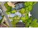 Aerial view showcasing the property's layout, with expansive outdoor living spaces and lake access at 242 W Warford Dr, , IN 46164