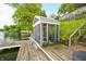 Quaint boathouse on the water with waterfront access, ideal for serene relaxation and leisure at 242 W Warford Dr, , IN 46164