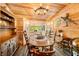 Charming dining area with wood accents, round table, and built-in cabinet, perfect for gatherings at 242 W Warford Dr, , IN 46164