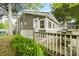 Beautiful home exterior with a fenced in porch, offering privacy and outdoor enjoyment at 242 W Warford Dr, , IN 46164