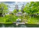 Charming lake house with a dock and screened-in porch, perfect for waterfront enjoyment at 242 W Warford Dr, , IN 46164