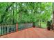 Cozy deck surrounded by lush greenery, perfect for relaxing outdoors at 2592 Highmount Ct, Carmel, IN 46033
