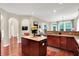 Charming kitchen featuring cherry cabinets, granite countertops, and stainless steel dishwasher at 2592 Highmount Ct, Carmel, IN 46033