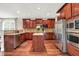 Well-equipped kitchen boasts stainless steel appliances and granite countertops at 2592 Highmount Ct, Carmel, IN 46033