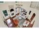 Bright living room featuring high ceilings, a chandelier, a fireplace, and numerous windows at 2592 Highmount Ct, Carmel, IN 46033
