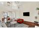 Spacious living room with hardwood floors and staircase at 2592 Highmount Ct, Carmel, IN 46033