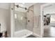 The shower features marble-look walls, gold accents, and a glass door at 2592 Highmount Ct, Carmel, IN 46033