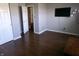 Modern bedroom with wood-look flooring, neutral paint, and ample space for personalization and comfort at 2628 Newaygo Dr, Indianapolis, IN 46217