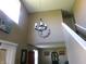 Inviting foyer features soaring ceilings, modern chandelier, and an open view to the living spaces at 2628 Newaygo Dr, Indianapolis, IN 46217