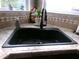 Close up on the sink, tile counter tops and back splash at 2628 Newaygo Dr, Indianapolis, IN 46217
