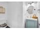 Charming powder room with shiplap walls and a stylish vanity, perfect for guests at 2898 Violet W Ct, Columbus, IN 47201