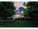 Beautiful two-story home with lush green lawn and mature trees in a serene setting at 2898 Violet W Ct, Columbus, IN 47201