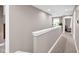 Well-lit hallway with neutral tones and carpeted floors, connecting different areas of the home with ease at 2898 Violet W Ct, Columbus, IN 47201