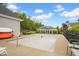 Fenced in backyard pool area with landscaping and nearby home at 2898 Violet W Ct, Columbus, IN 47201