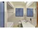 Bathroom with tile floors and cabinet and tub/shower combo at 3215 E Edgewood Ave, Indianapolis, IN 46227