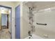 Bathroom features a tub/shower and grab bars at 3215 E Edgewood Ave, Indianapolis, IN 46227