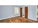 Bedroom with wood floor and closet, with natural light at 3215 E Edgewood Ave, Indianapolis, IN 46227