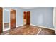 Bedroom with wood floor and closet, with two tone paint at 3215 E Edgewood Ave, Indianapolis, IN 46227