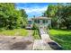 A charming single-Gathering home with a ramp, complemented by a well-maintained lawn, offering convenience and appeal at 3215 E Edgewood Ave, Indianapolis, IN 46227