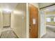 Hallway view with access to multiple rooms in the house at 3215 E Edgewood Ave, Indianapolis, IN 46227