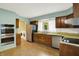 Spacious kitchen featuring stainless steel appliances and built-in oven at 3215 E Edgewood Ave, Indianapolis, IN 46227