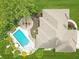 Aerial view showcasing the backyard pool, patio, landscaping, and well-maintained yard of the residence at 3335 Guilford Ln, Plainfield, IN 46168