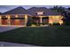 Charming home with manicured lawn, a three-car garage, and tasteful landscaping at 3335 Guilford Ln, Plainfield, IN 46168