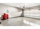 Spacious garage featuring clean epoxy floors, ample room for storage, and a well-lit interior at 3335 Guilford Ln, Plainfield, IN 46168