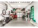 Well-organized garage with storage solutions and space for tools, bikes, and outdoor equipment at 3335 Guilford Ln, Plainfield, IN 46168