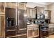 Well-equipped kitchen featuring stainless steel appliances, wood cabinets, and granite countertops at 3335 Guilford Ln, Plainfield, IN 46168