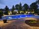Backyard pool with patio and furniture, perfect for outdoor entertaining and summer relaxation at 3335 Guilford Ln, Plainfield, IN 46168