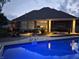 Backyard pool and patio with cozy seating area, ideal for relaxing and enjoying the outdoor ambiance at 3335 Guilford Ln, Plainfield, IN 46168