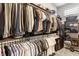 Walk-in closet features custom shelving and ample storage for a well-organized wardrobe at 3335 Guilford Ln, Plainfield, IN 46168