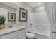Bright bathroom with single sink vanity and combined tub and shower at 3449 Glasgow Pl, Danville, IN 46122