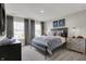 Well-lit bedroom with gray walls, neutral carpet and dinosaur-themed artwork at 3449 Glasgow Pl, Danville, IN 46122