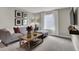 Cozy loft area featuring plush seating, a stylish coffee table, and a mounted TV for entertainment at 3449 Glasgow Pl, Danville, IN 46122