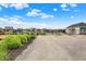 Community amenities featuring a playground and swimming pool, surrounded by lush greenery at 442 Mozart Dr, Greenfield, IN 46140