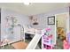 Charming bedroom designed for , featuring a playful theme, lofted bed, and ample toys at 442 Mozart Dr, Greenfield, IN 46140