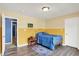 Bedroom with hard wood floors, area rug, and a blue bed at 442 Mozart Dr, Greenfield, IN 46140