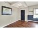 Spacious foyer with dark wood floors, recessed lighting, and stylish wainscoting at 442 Mozart Dr, Greenfield, IN 46140