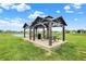 Community gazebo and picnic area with tables offers a great spot for gatherings and outdoor enjoyment at 442 Mozart Dr, Greenfield, IN 46140
