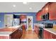 Well-equipped kitchen with an island, stainless steel appliances, and a walk-in pantry at 442 Mozart Dr, Greenfield, IN 46140