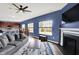 Open-concept living area flows into the kitchen with a view of the breakfast nook and fireplace at 442 Mozart Dr, Greenfield, IN 46140