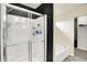 Shower with sliding glass doors, adjacent to a soaking tub at 442 Mozart Dr, Greenfield, IN 46140