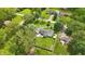 Aerial view of a house with a well-kept lawn in a tree-filled neighborhood at 4614 Thornleigh Dr, Indianapolis, IN 46226