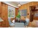 Charming dining nook with wood paneling and natural light at 4614 Thornleigh Dr, Indianapolis, IN 46226