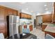 Well-lit kitchen with stainless steel appliances and breakfast nook at 4614 Thornleigh Dr, Indianapolis, IN 46226