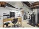 Basement office space with large metal ventilation, file cabinets, computer and printer at 4614 Thornleigh Dr, Indianapolis, IN 46226