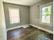 Bright bedroom with wood floors and natural light at 4814 E New York St, Indianapolis, IN 46201